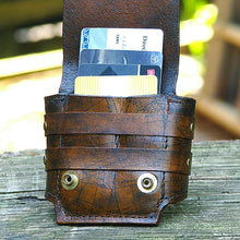 strappy brown leather wrist wallet cuff for bikers and travelers